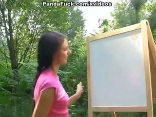 Sedusive strap on fuck with young artist outdoor