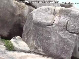 Groovy fuck near the stone wall