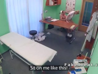 Medical person eats and fucks nurse on a desk