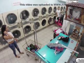 Brunette goddess Annika Eve fucking a chap in the laundry shop